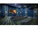 Community theater room with seating at 8989 Cabot Cliffs Dr, Davenport, FL 33896