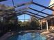 Inviting screened pool and spa with ample deck space at 899 W Lake Marion Rd, Haines City, FL 33844