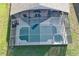 Aerial view of home with screened-in pool and spa at 16741 Rising Star Dr, Clermont, FL 34714