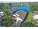 House with lake view and screened-in pool at 16741 Rising Star Dr, Clermont, FL 34714