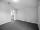 Spacious bedroom with grey carpet and an ensuite bathroom at 16741 Rising Star Dr, Clermont, FL 34714