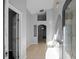 Bright entryway with tile floor and arched doorways at 16741 Rising Star Dr, Clermont, FL 34714
