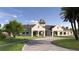 Community clubhouse with a charming design and landscaping at 4471 Sw 84Th Street Rd, Ocala, FL 34476
