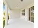 Covered patio with ample space for outdoor dining and relaxation at 4471 Sw 84Th Street Rd, Ocala, FL 34476