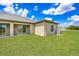 House with covered patio and a large backyard at 3179 Seville St, Lake Alfred, FL 33850