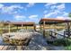 Scenic dock with two covered boat slips perfect for enjoying water activities and the beautiful lake views at 6141 Palmetto Dr, Indian Lake Estates, FL 33855