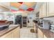 Efficient kitchen with granite countertops, modern appliances, and ample storage at 6141 Palmetto Dr, Indian Lake Estates, FL 33855