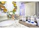 Bathroom with granite countertop, vessel sink, and decorative wall art at 3231 Cupid Pl Pl, Kissimmee, FL 34747