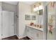 Double vanity bathroom with granite countertop at 3231 Cupid Pl Pl, Kissimmee, FL 34747