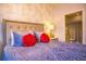 Main bedroom with en-suite bathroom access at 3231 Cupid Pl Pl, Kissimmee, FL 34747
