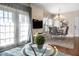 Bright dining area with glass table and six chairs at 3231 Cupid Pl Pl, Kissimmee, FL 34747