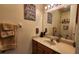 Small bathroom with single vanity and toilet at 469 Blue Heron Cir # 469, River Ranch, FL 33867