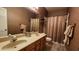 Bathroom with double vanity and shower/tub combo at 469 Blue Heron Cir # 469, River Ranch, FL 33867