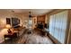 Spacious living room with a cozy stone fireplace at 469 Blue Heron Cir # 469, River Ranch, FL 33867