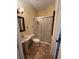 Bathroom with walk-in shower, toilet and pedestal sink at 2300 Se 73Rd Loop, Ocala, FL 34480