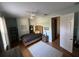Bright bedroom with wood flooring, a comfortable bed and plenty of natural light at 2300 Se 73Rd Loop, Ocala, FL 34480