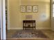Bright entryway with decorative rug and console table at 2300 Se 73Rd Loop, Ocala, FL 34480