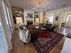 Spacious living room with fireplace and large windows at 2300 Se 73Rd Loop, Ocala, FL 34480