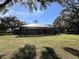 Large screened patio perfect for outdoor entertaining at 2300 Se 73Rd Loop, Ocala, FL 34480
