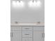 Double vanity bathroom with white cabinets and quartz countertops at 5830 Sw 121 St, Ocala, FL 34481