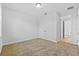 Bright bedroom with double door closet and access to hallway at 5830 Sw 121 St, Ocala, FL 34481