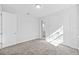 Spacious bedroom with ensuite bathroom access and neutral decor at 5830 Sw 121 St, Ocala, FL 34481