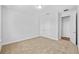Light-filled bedroom with neutral carpet and double doors to closet at 5830 Sw 121 St, Ocala, FL 34481