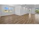 Bright dining room with hardwood floors and large windows at 5830 Sw 121 St, Ocala, FL 34481