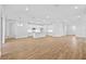 Spacious living room with hardwood floors and recessed lighting at 5830 Sw 121 St, Ocala, FL 34481