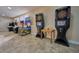 Recreational room with arcade games and dart boards at 3681 Magnolia Dr, Indian Lake Estates, FL 33855