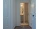 Small bathroom with a vanity and shelving at 3681 Magnolia Dr, Indian Lake Estates, FL 33855