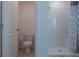 Simple bathroom with toilet and shower stall at 3681 Magnolia Dr, Indian Lake Estates, FL 33855