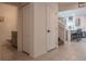 Powder room with gray vanity, toilet, and tile flooring at 3681 Magnolia Dr, Indian Lake Estates, FL 33855