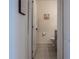 Simple bathroom with gray vanity and toilet at 3681 Magnolia Dr, Indian Lake Estates, FL 33855