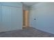 Bedroom with a closet and access to a bathroom and pantry at 3681 Magnolia Dr, Indian Lake Estates, FL 33855