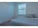 Bedroom with a double bed and large closet at 3681 Magnolia Dr, Indian Lake Estates, FL 33855