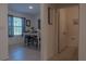 Bright dining area with table and chairs near half-bath at 3681 Magnolia Dr, Indian Lake Estates, FL 33855