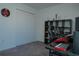 Spacious home office with a desk, chair, and built-in shelving at 3681 Magnolia Dr, Indian Lake Estates, FL 33855