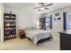 Main bedroom with plush carpeting, ample closet space, and built-in shelving at 16317 Saint Augustine St, Clermont, FL 34714