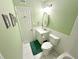 Bathroom with a single vanity, toilet, medicine cabinet and fresh paint at 1600 W Lake Parker Dr # A6, Lakeland, FL 33805