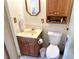 Bathroom with a single vanity, toilet, mirror and medicine cabinet at 1600 W Lake Parker Dr # A6, Lakeland, FL 33805