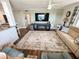 Comfortable living room with wood flooring, modern decor, and view to the kitchen at 1600 W Lake Parker Dr # A6, Lakeland, FL 33805