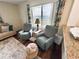 Cozy living area with comfortable seating, scenic views, and stylish decorations at 1600 W Lake Parker Dr # A6, Lakeland, FL 33805