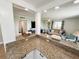 Bright living room featuring new granite countertops, open floorplan, and recessed lighting at 1600 W Lake Parker Dr # A6, Lakeland, FL 33805
