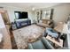 Inviting living room with large rug, fireplace, and comfortable seating perfect for relaxation at 1600 W Lake Parker Dr # A6, Lakeland, FL 33805
