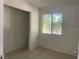 Simple bedroom with closet and window at 810 Avenue L Sw, Winter Haven, FL 33880
