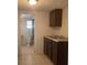 Kitchen with granite countertop and cabinets at 810 Avenue L Sw, Winter Haven, FL 33880