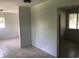 Open living area with tile floors and doorway at 810 Avenue L Sw, Winter Haven, FL 33880