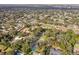 Aerial view showing home's location in a residential neighborhood at 1614 King James Ct, Lakeland, FL 33813