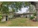 Landscaped backyard, perfect for outdoor fun at 1614 King James Ct, Lakeland, FL 33813
